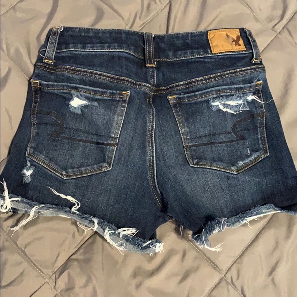 Medium wash ripped American eagle jeans